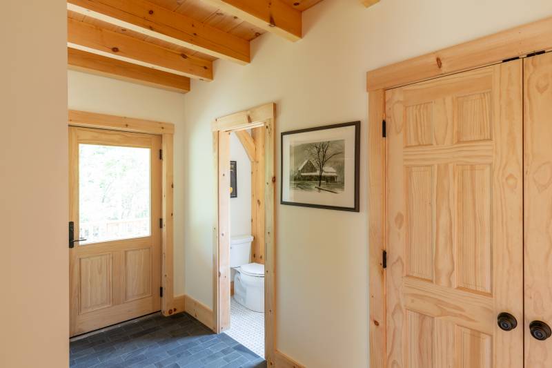 A half bathroom can be found near the entry door