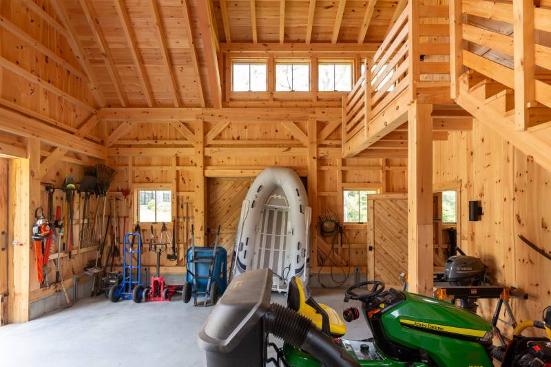 A partial loft creates cathedral ceilings in the front of the barn
