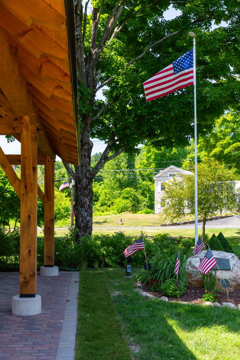 Detailed rafter ends • The pavilion is surrounded by thoughtful landscaping