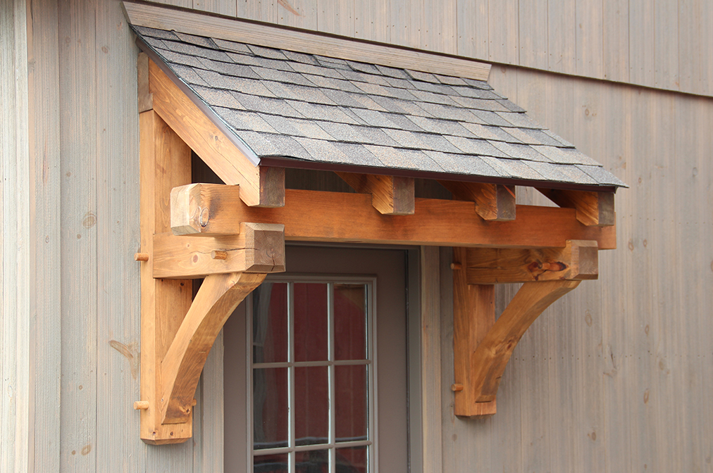 4' Timber Frame Eyebrow Roof Above Overhead Door